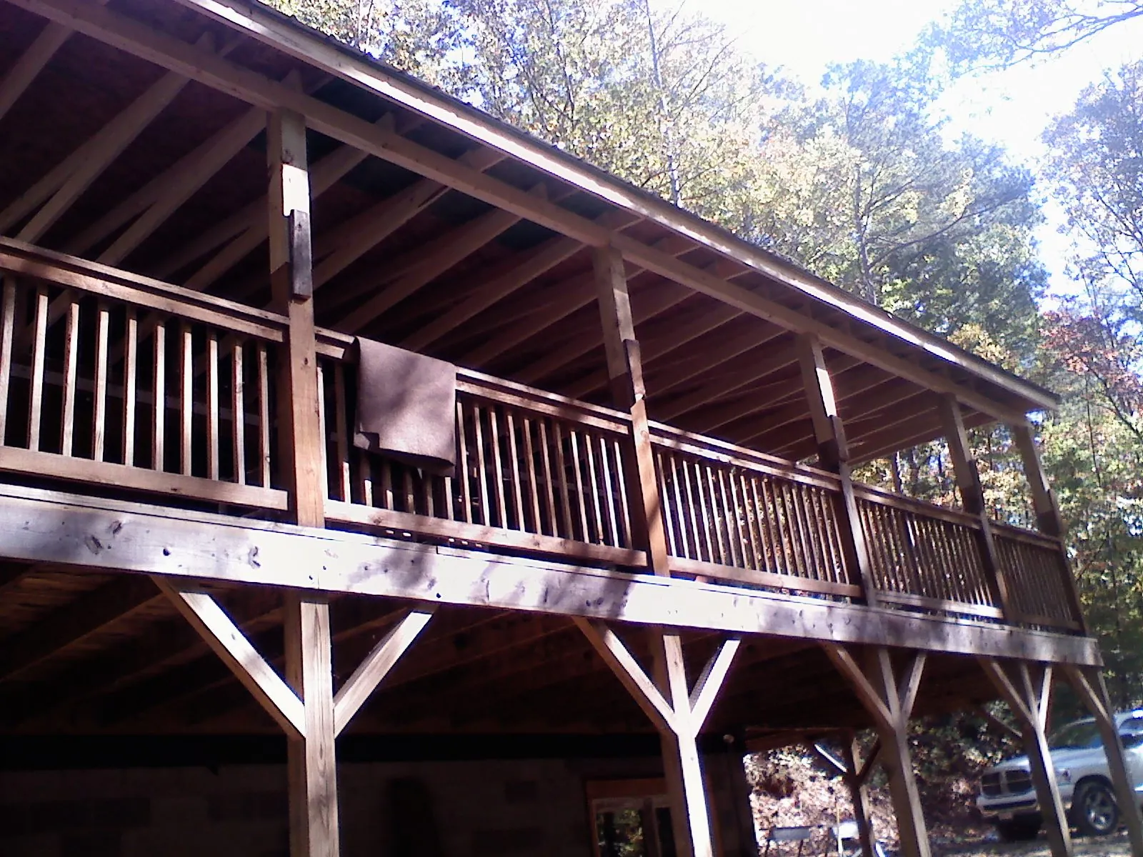 Timber framing under a new elevated porch and deck — Roof Leak Repair in Blooming Grove by Roofing Brothers